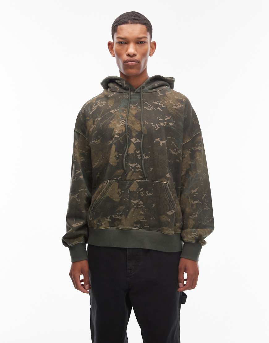 Carhartt WIP - Benton - Kastiger Kapuzenpullover mit grünem Camouflagemuster von Carhartt WIP