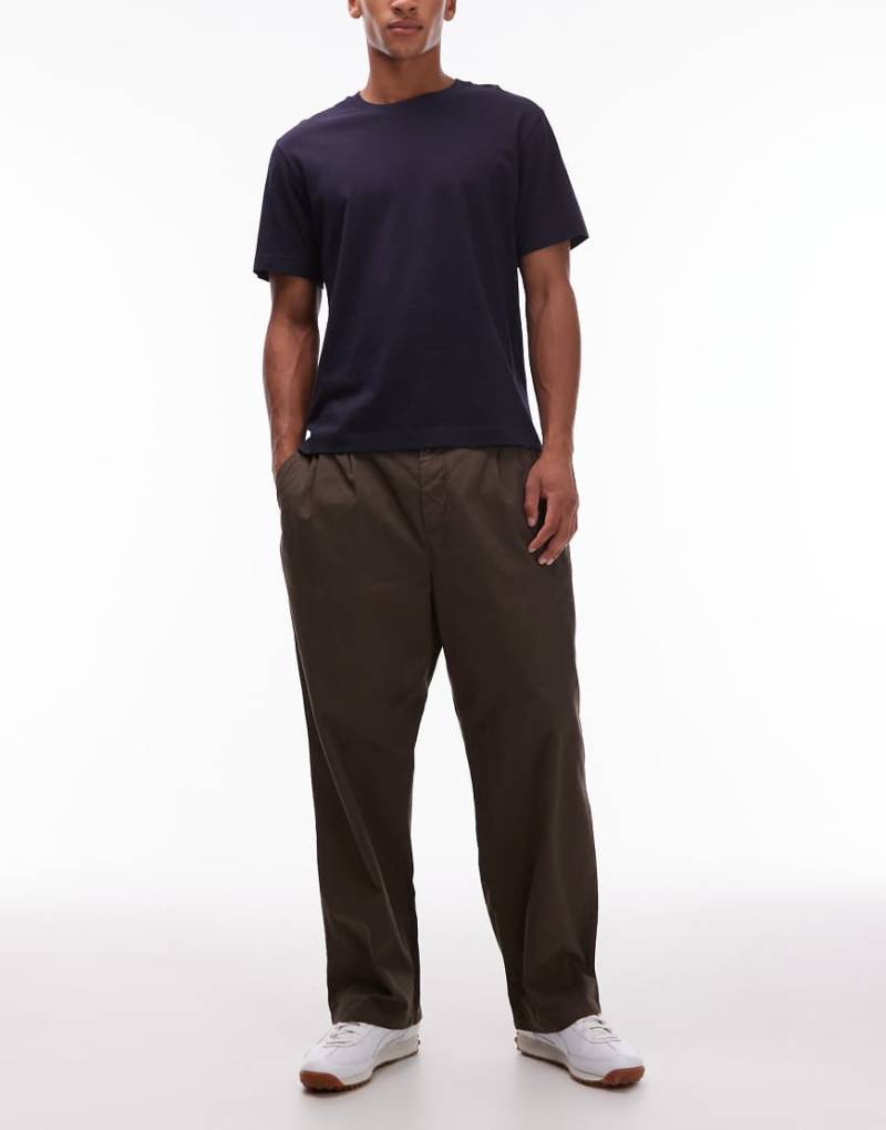 Carhartt WIP - Evan - Schmal zulaufende Hose in Braun mit lockerem Schnitt-Brown von Carhartt WIP