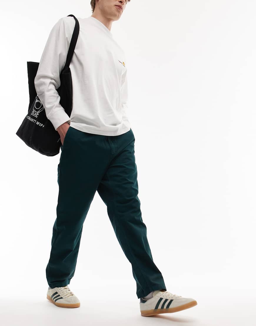 Carhartt WIP - Flint - Schmal zulaufende Hose in Grün mit normalem Schnitt von Carhartt WIP