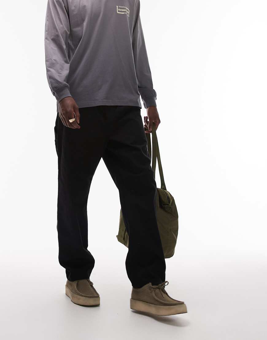 Carhartt WIP - Flint - Schmal zulaufende Hose in Schwarz mit normalem Schnitt Carhartt WIP - Flint - Schmal zulaufende Hose in Schwarz mit normalem Schnitt von Carhartt WIP