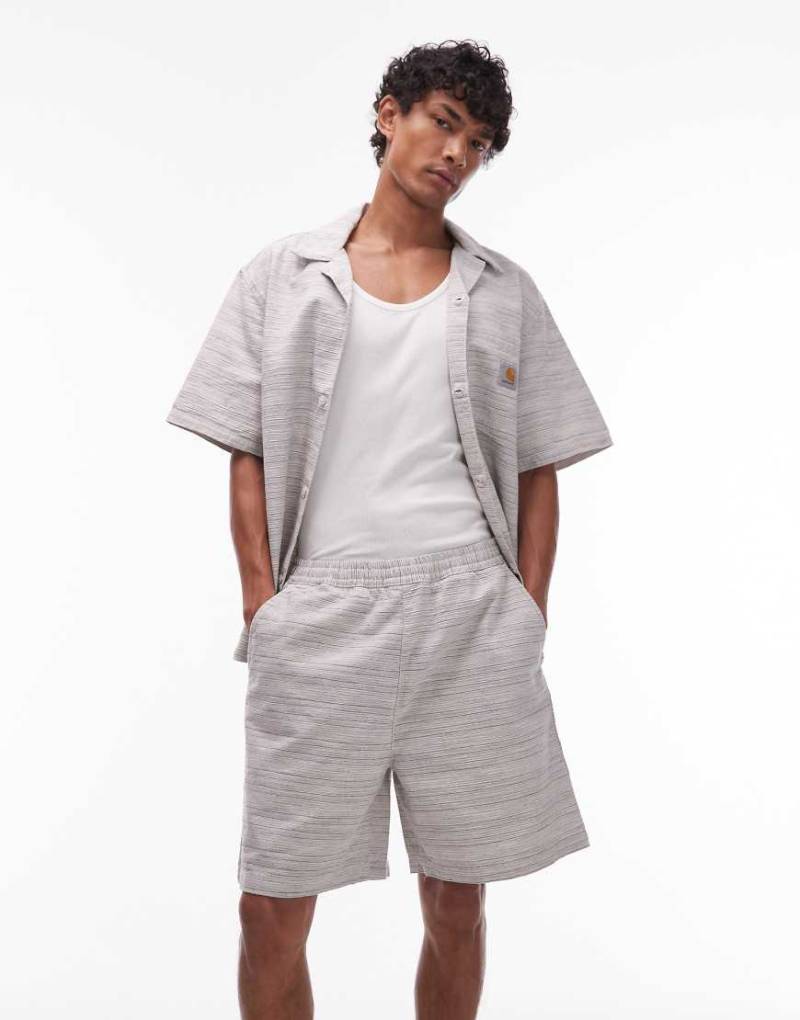 Carhartt WIP - Gellar - Strukturierte Shorts in Creme mit lockerem Schnitt, Kombiteil-Neutral von Carhartt WIP