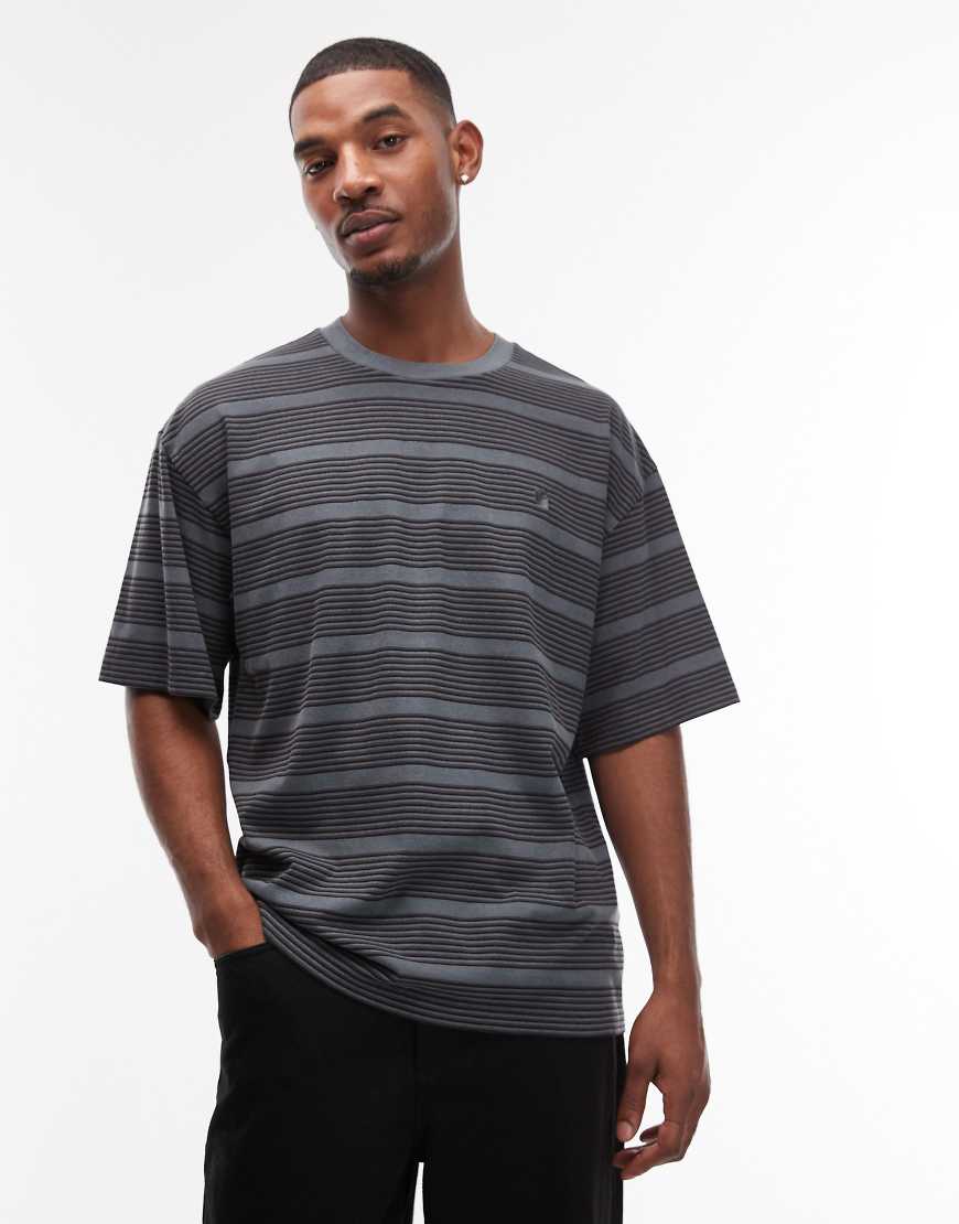 Carhartt WIP - Hanson - Oversize-T-Shirt mit Streifen in Grün und Schwarz-Bunt von Carhartt WIP
