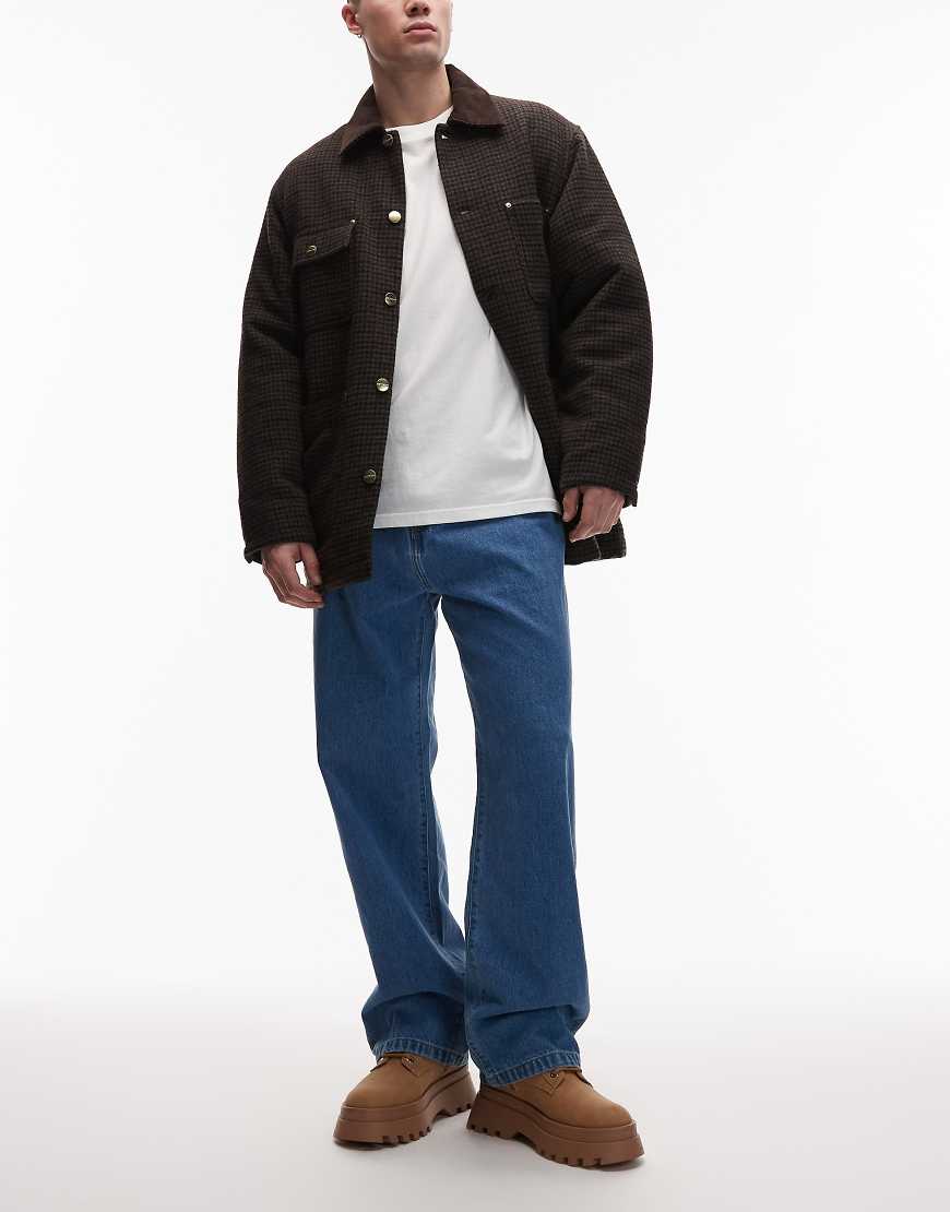 Carhartt WIP - Landon - Lockere, schmal zulaufende Denim-Jeans in blauer Stone-Waschung von Carhartt WIP