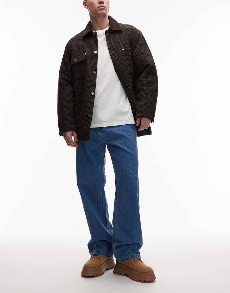 Carhartt WIP - Landon - Lockere, schmal zulaufende Denim-Jeans in blauer Stone-Waschung von Carhartt WIP