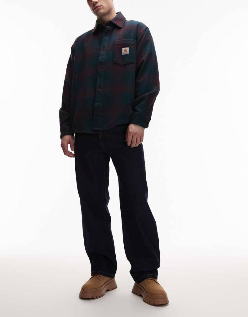 Carhartt WIP - Landon - Schmal zulaufende Denim-Jeans in Indigoblau mit lockerem Schnitt von Carhartt WIP