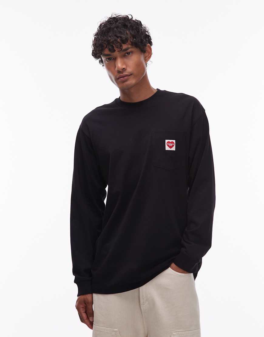 Carhartt WIP - Langärmliges Loose Fit Shirt in Schwarz mit Brusttasche mit Herzmotiv von Carhartt WIP