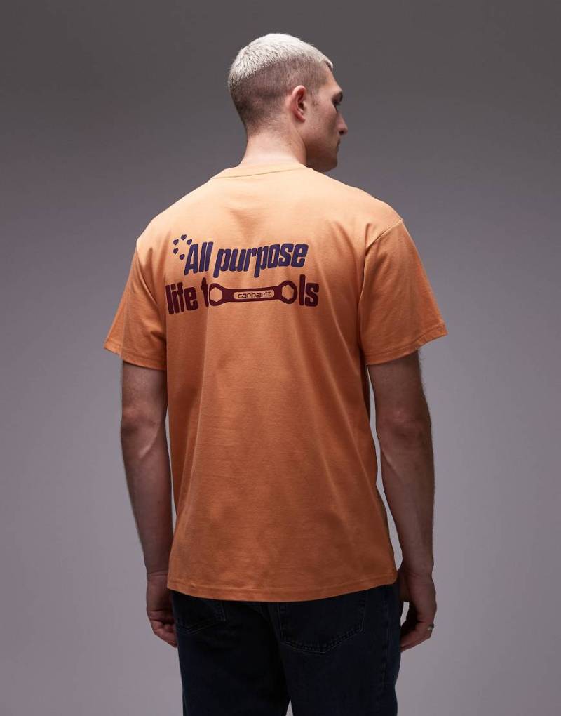 Carhartt WIP - Locker geschnittenes T-Shirt in Orange mit „All Tools"-Print von Carhartt WIP
