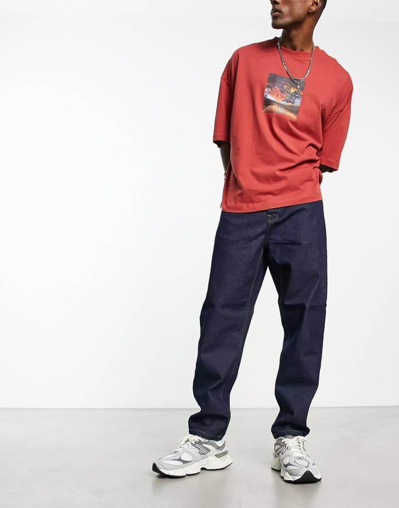 Carhartt WIP - Newel - Leger geschnittene, schmal zulaufende Jeans in blauer Stone-Waschung von Carhartt WIP