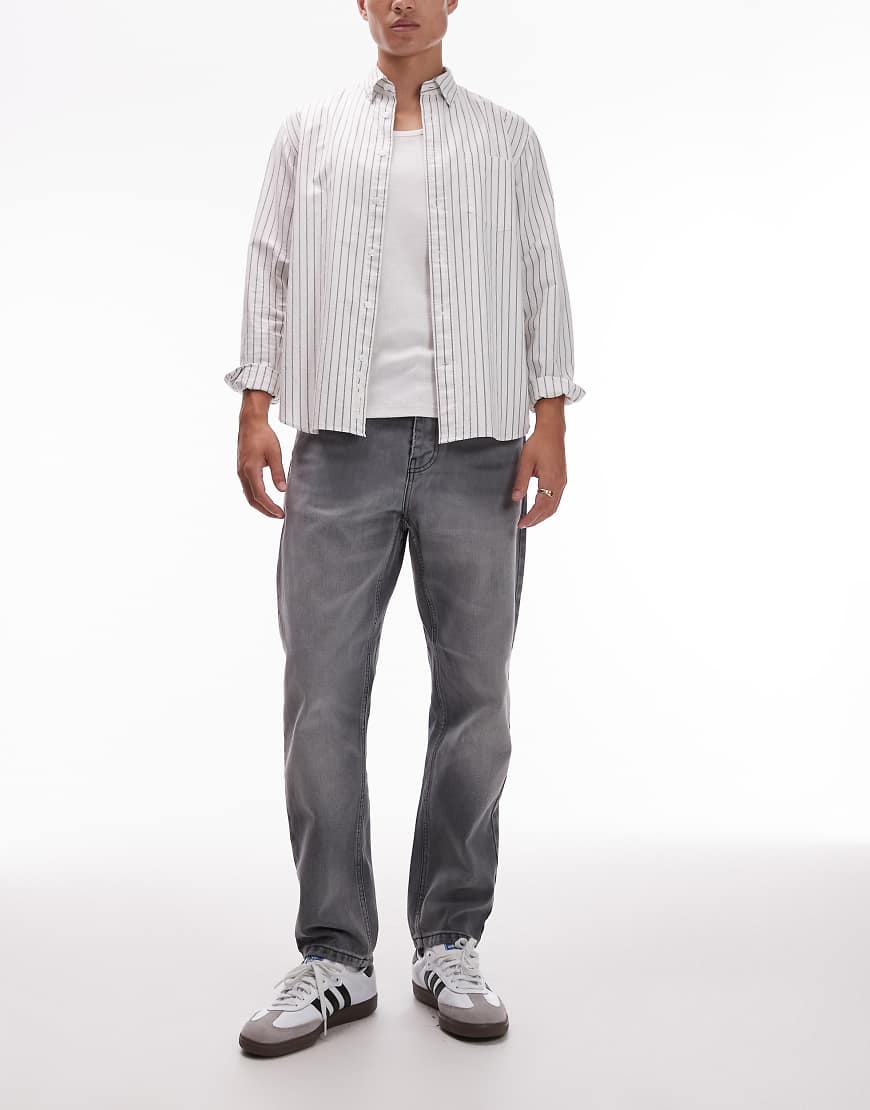 Carhartt WIP - Newel - Locker geschnittene, schmal zulaufende Jeans in verwaschenem Schwarz Carhartt WIP - Newel - Locker geschnittene, schmal zulaufende Jeans in verwaschenem Schwarz von Carhartt WIP