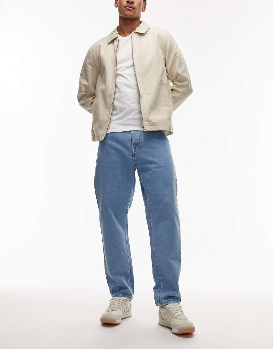 Carhartt WIP - Newel - Schmal zulaufende Jeans in Hellblau mit lockerem Schnitt von Carhartt WIP