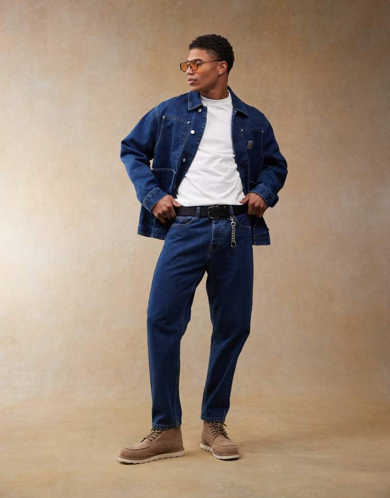 Carhartt WIP - Newel - Schmal zulaufende Jeans in mittlerer Waschung mit lockerem Schnitt-Blau von Carhartt WIP