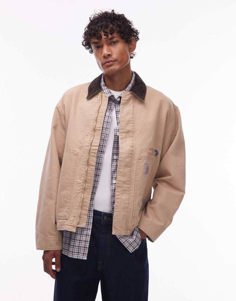 Carhartt WIP - OG Arcan - Jacke in Beige mit Motivprint auf dem Rücken-Neutral von Carhartt WIP