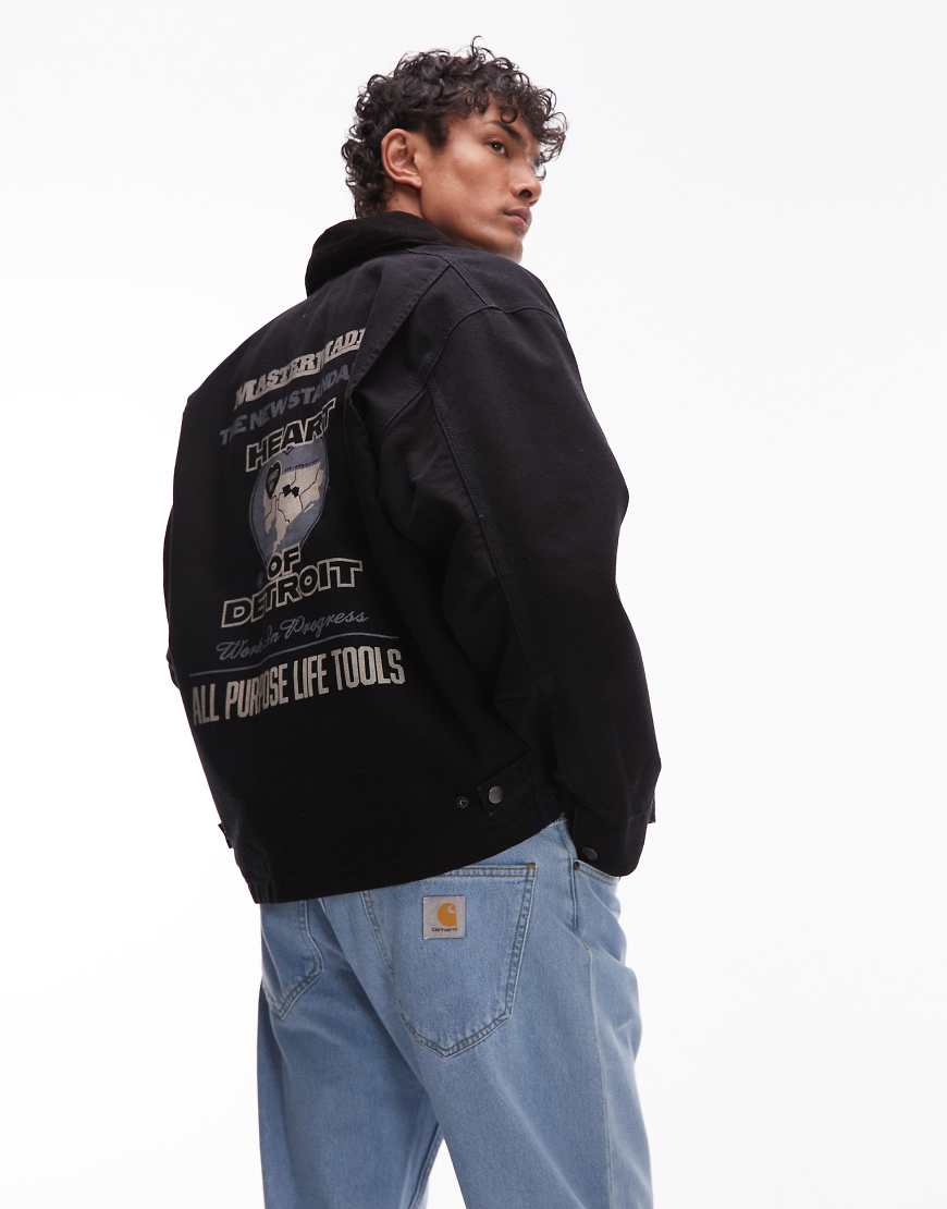 Carhartt WIP - OG Arcan - Jacke in Schwarz mit grafischem Rückenprint Carhartt WIP - OG Arcan - Jacke in Schwarz mit grafischem Rückenprint von Carhartt WIP