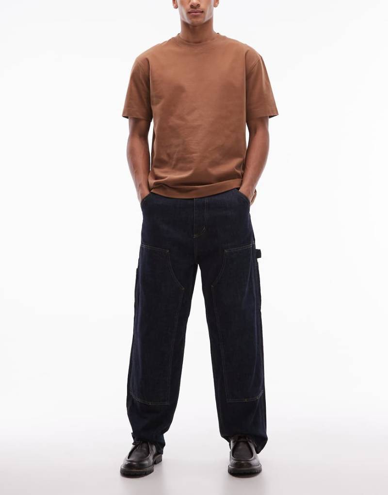 Carhartt WIP - OG - Locker sitzende Jeans in dunkelblauer Waschung mit verstärkter Kniepartie und geradem Schnitt Carhartt WIP - OG - Locker sitzende Jeans in dunkelblauer Waschung mit verstärkter Kniepartie und geradem Schnitt von Carhartt WIP