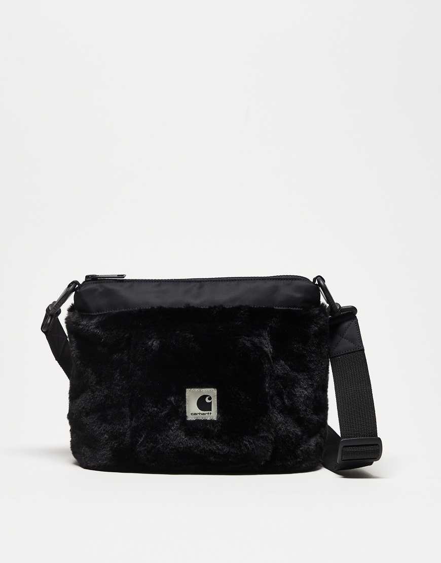 Carhartt WIP - Olney - Tasche mit Kunstpelz auf den Seiten in Schwarz von Carhartt WIP