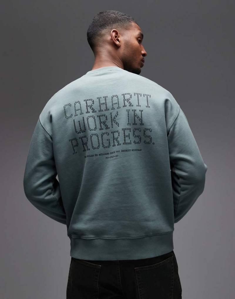 Carhartt WIP - Punched - Oversize-Pullover-Sweatshirt in verwaschenem Grün von Carhartt WIP