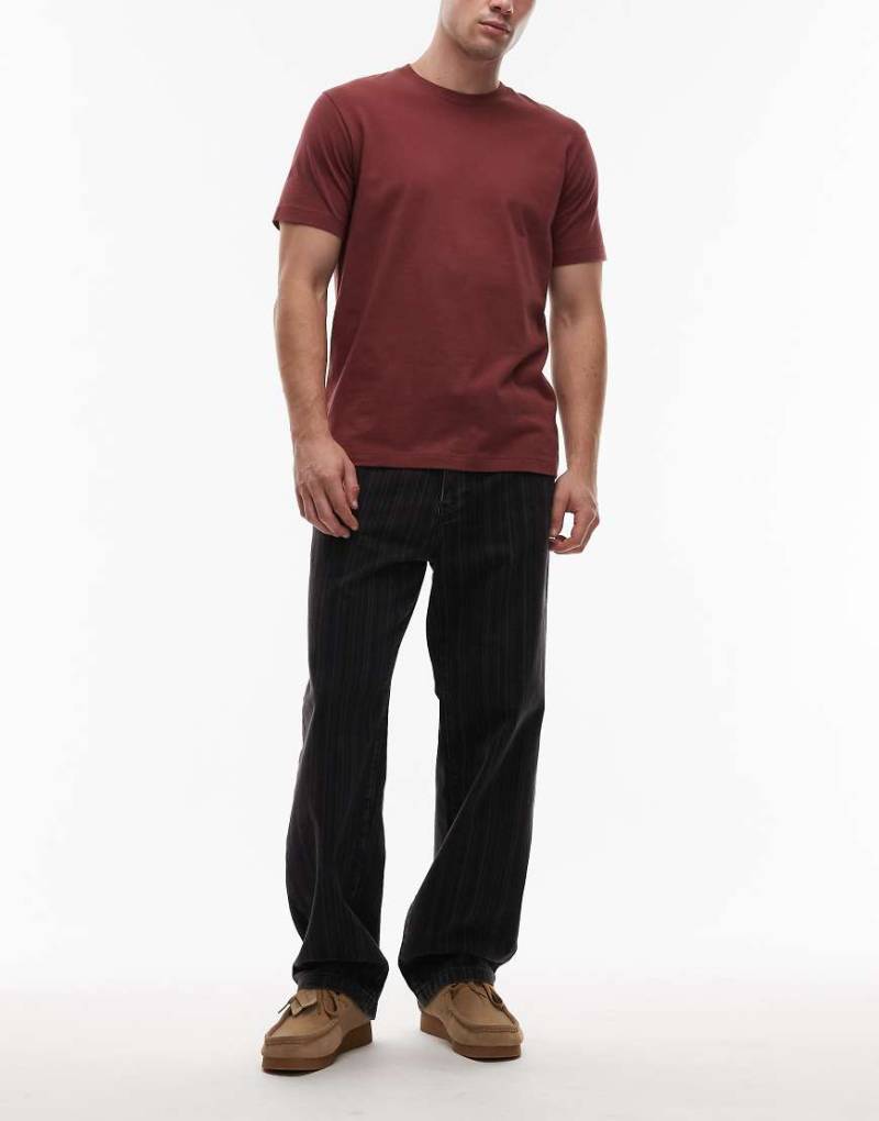 Carhartt WIP - Rylan - Schmal zulaufende, locker sitzende Jeans in Schwarz mit Streifen von Carhartt WIP