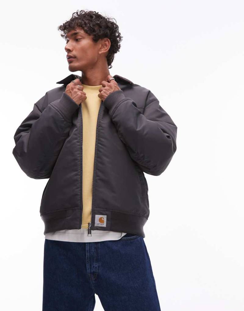 Carhartt WIP - Sante Fe Alumni - Steppjacke in Grau mit Reißverschluss von Carhartt WIP