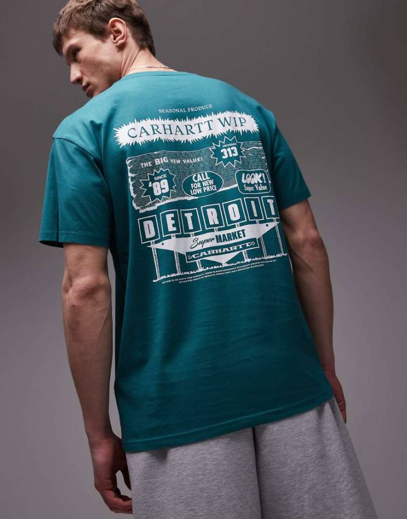 Carhartt WIP - T-Shirt in Grün mit Katalog-Print von Carhartt WIP