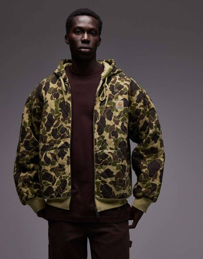 Carhartt WIP - Vista - Gesteppte Oversize-Kapuzenjacke mit Military-Muster-Grün von Carhartt WIP