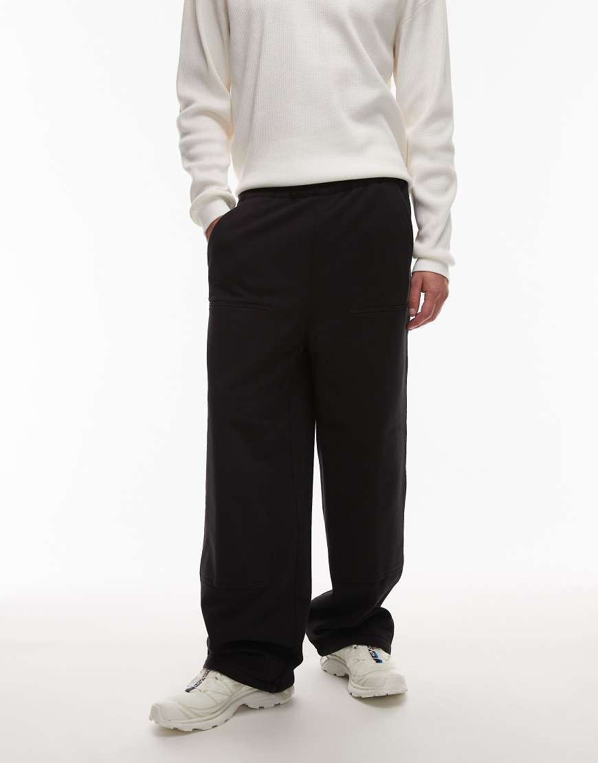 Carhartt WIP - Weite Jogginghose in Schwarz mit doppelter Stofflage im Kniebereich von Carhartt WIP