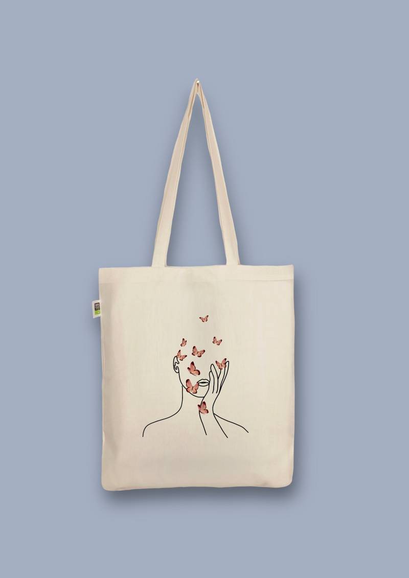 Handbedruckter Bio-Jutebeutel „Gesicht Schmetterlinge" von CaterinaMariaAtelier