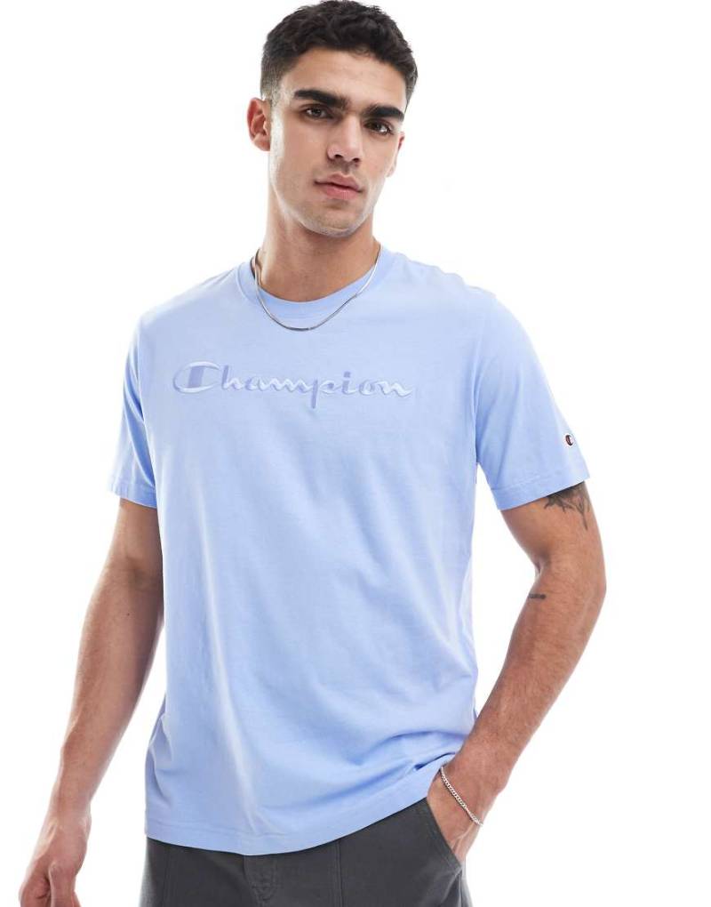 Champion - T-Shirt in Blau mit farblich abgestimmtem Logo von Champion