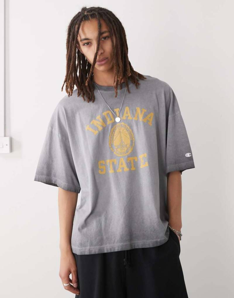 Champion - T-Shirt in Schwarz mit Grafik von Champion