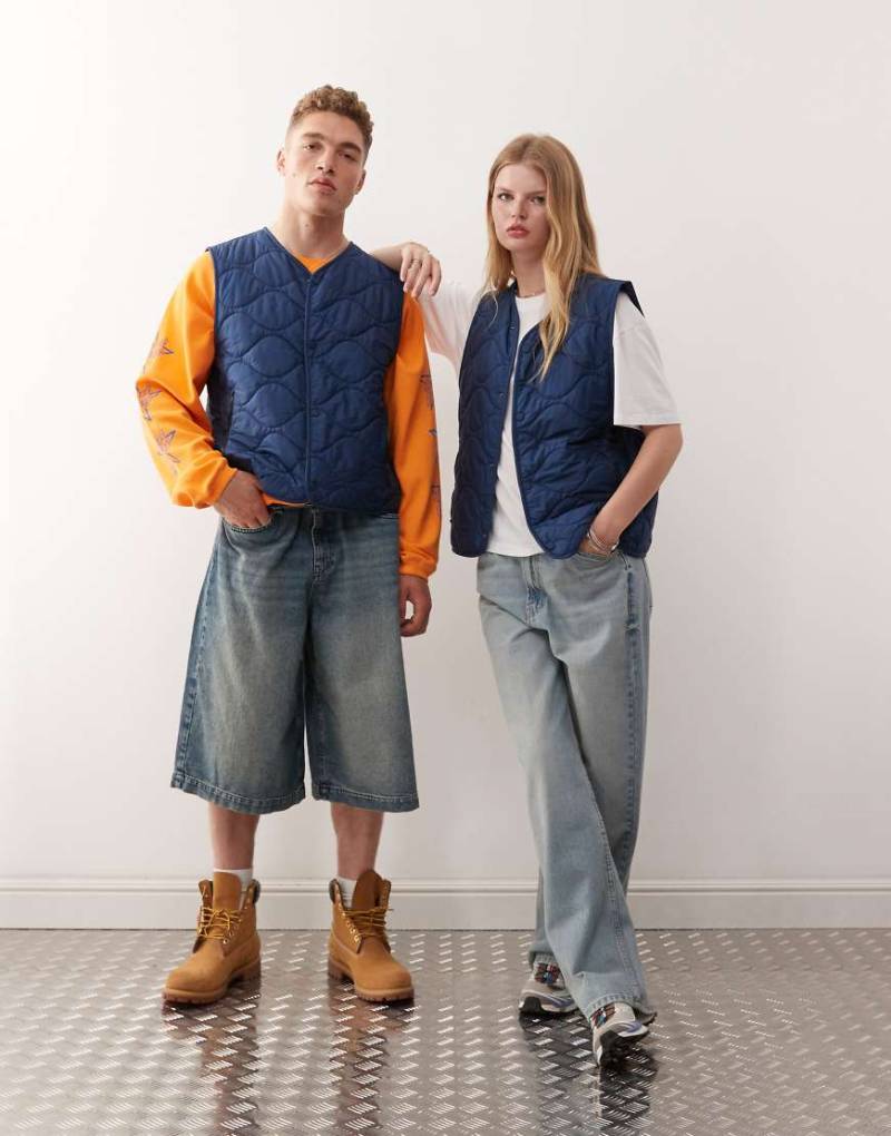 Champion - Wattierte Unisex-Weste in Marineblau von Champion