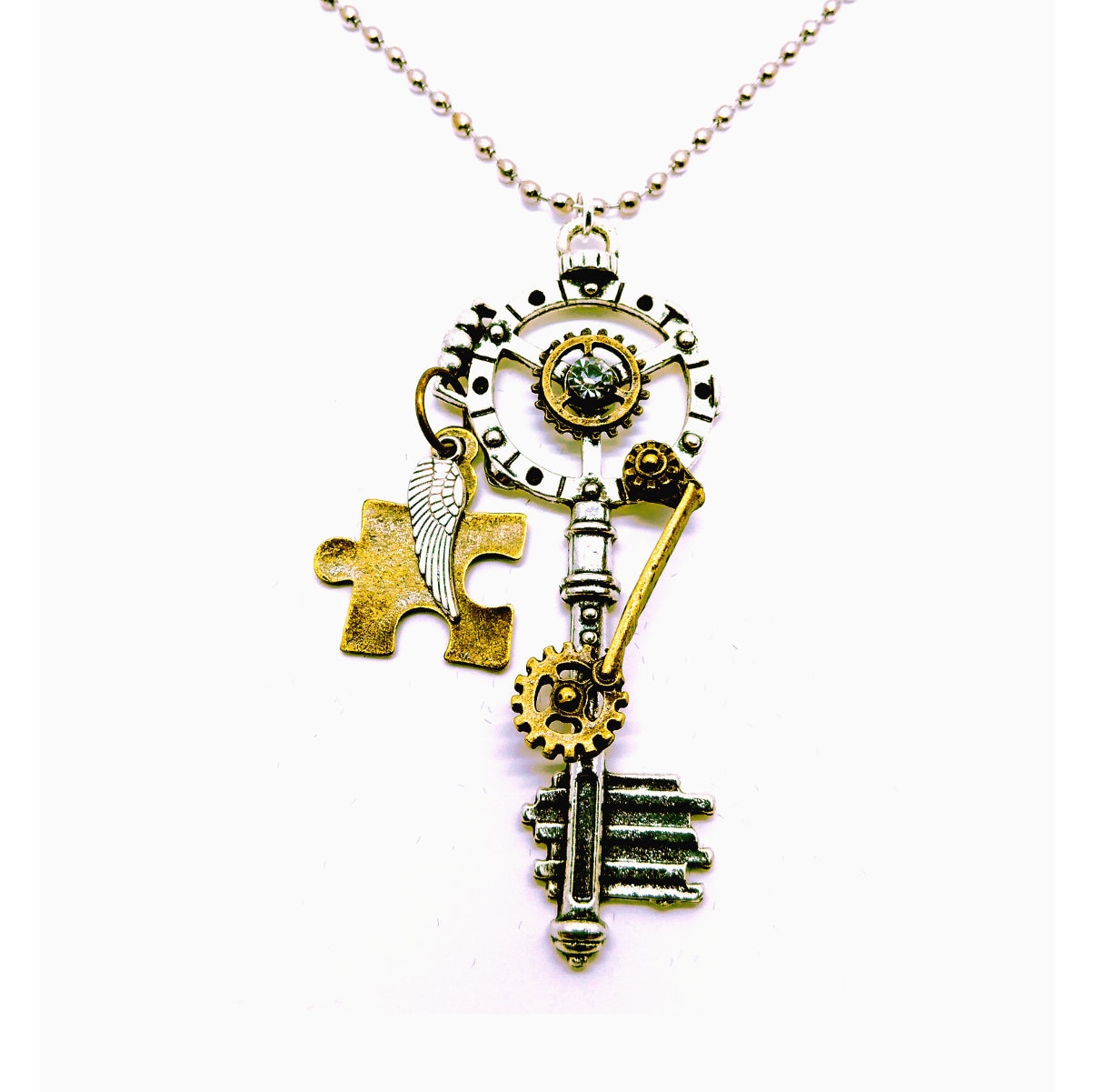 Autismus-Halskette, Autismus-Bewusstseinsschmuck, Autismus-Akzeptanz, Steampunk-Autismus-Halskette, Puzzle-Stück-Schmuck, Autismus-Halskette Autismus-Halskette, Autismus-Bewusstseinsschmuck, Autismus-Akzeptanz, Steampunk-Autismus-Halskette, Puzzle-Stück-Schmuck, Autismus-Halskette von CharmedByDragons