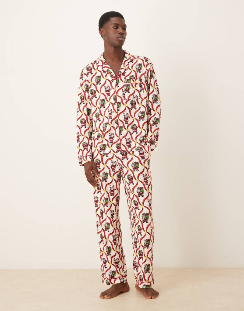 Chelsea Peers - Exklusiv - His & Hers - Langärmliger Pyjama aus Polyester mit Weihnachtsmann- und Zuckerstangen-Print und Reverskragen-Weiß von Chelsea Peers