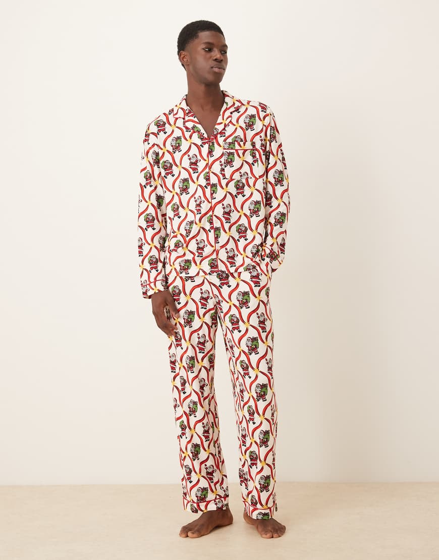 Chelsea Peers - Exklusiv - His & Hers - Langärmliger Pyjama aus Polyester mit Weihnachtsmann- und Zuckerstangen-Print und Reverskragen-Weiß von Chelsea Peers
