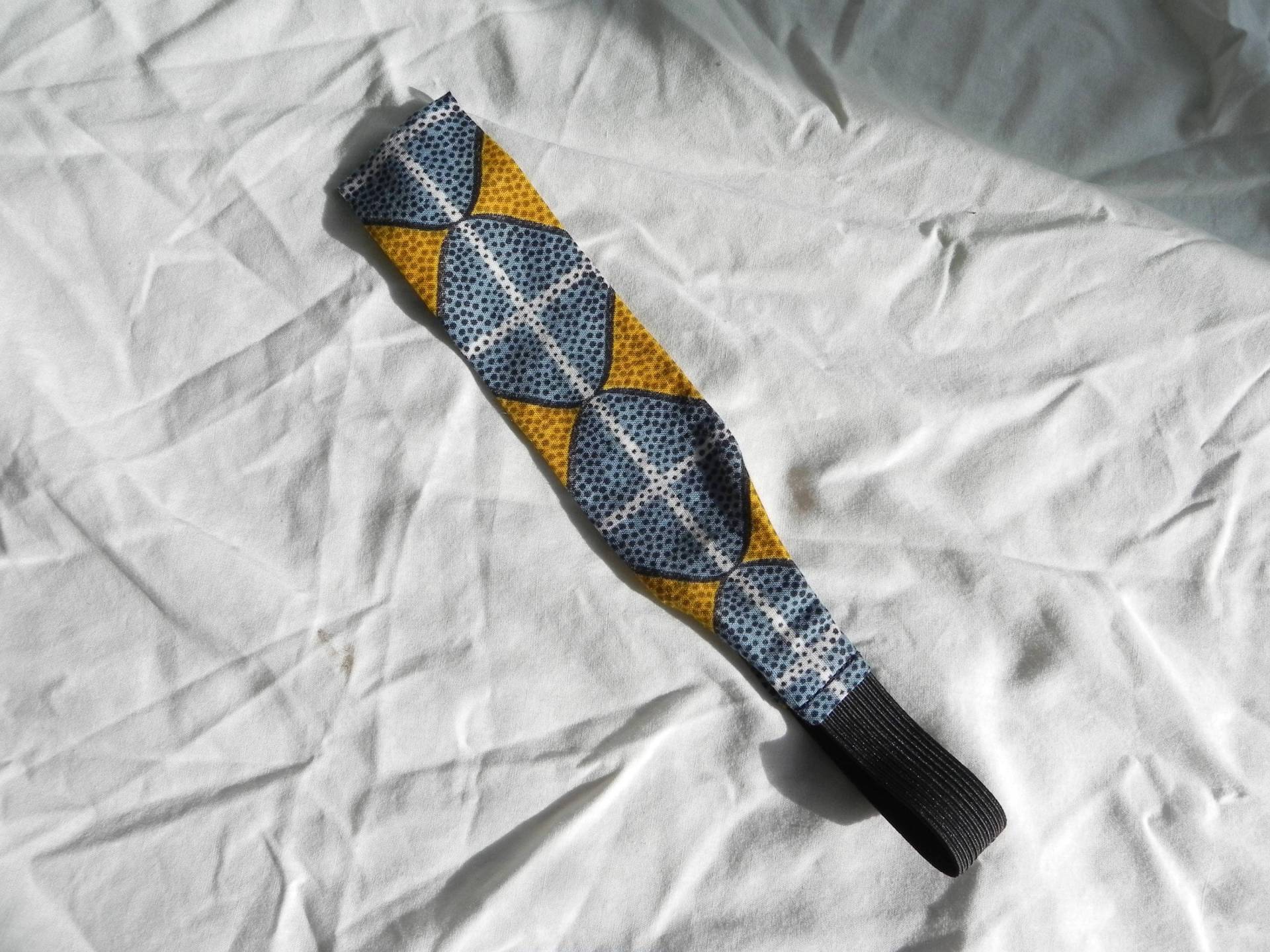 Wendestirnband Aus Blauem Und Gelbem Malawi-stoff Wendestirnband Aus Blauem Und Gelbem Malawi-stoff von ChumachaMalawi