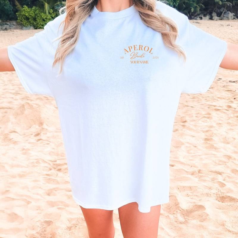 Aperol Spritz Bride Personalized Jga Date Name T-Shirt Backprint Shirt Y2K Holy Aperoli Vintage Alcohol Gift Aperitifo Aperol Spritz Bride Personalized Jga Date Name T-Shirt Backprint Shirt Y2K Holy Aperoli Vintage Alcohol Gift Aperitifo von CincerelyYoursShop