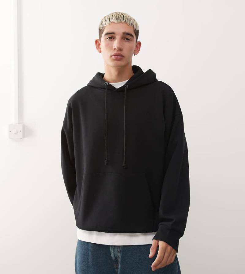 COLLUSION - Boxy Fit Kapuzenpullover in Schwarz COLLUSION - Boxy Fit Kapuzenpullover in Schwarz von Collusion