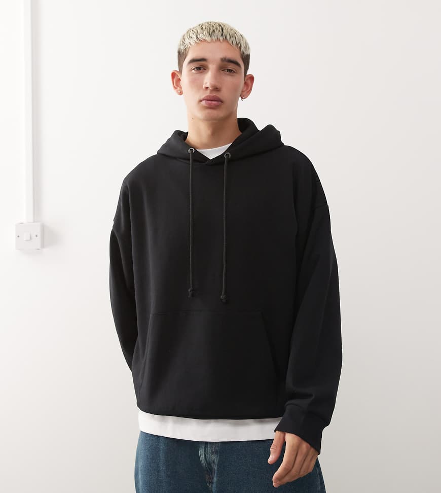 COLLUSION - Boxy Fit Kapuzenpullover in Schwarz von Collusion
