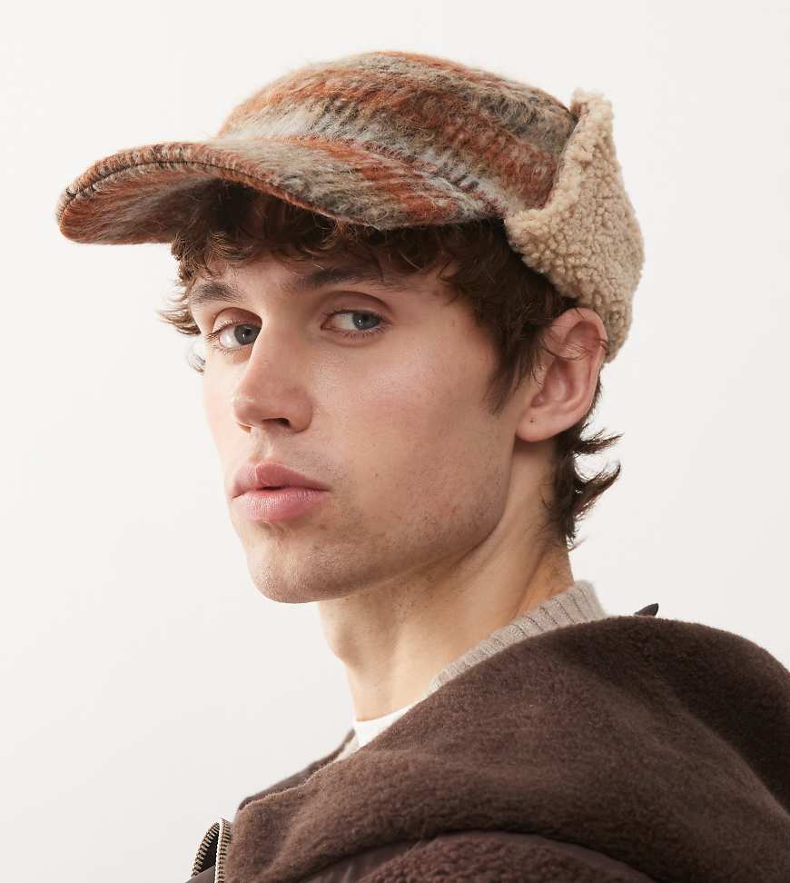 COLLUSION - Bunt gemusterte Schiebermütze mit Ohrenklappen mit Sherpafleece von Collusion