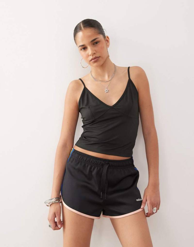 COLLUSION - Camisole in Schwarz mit tiefem V-Ausschnitt von Collusion