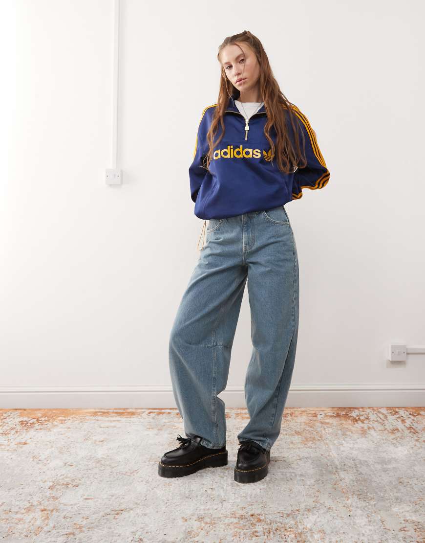 COLLUSION - Jeans in mittlerer Waschung mit abgerundetem, weitem Beinschnitt-Blau von Collusion