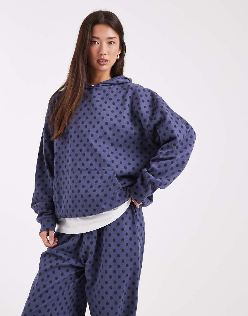 COLLUSION - Kapuzenpullover in Blau mit Punktemuster-Bunt von Collusion