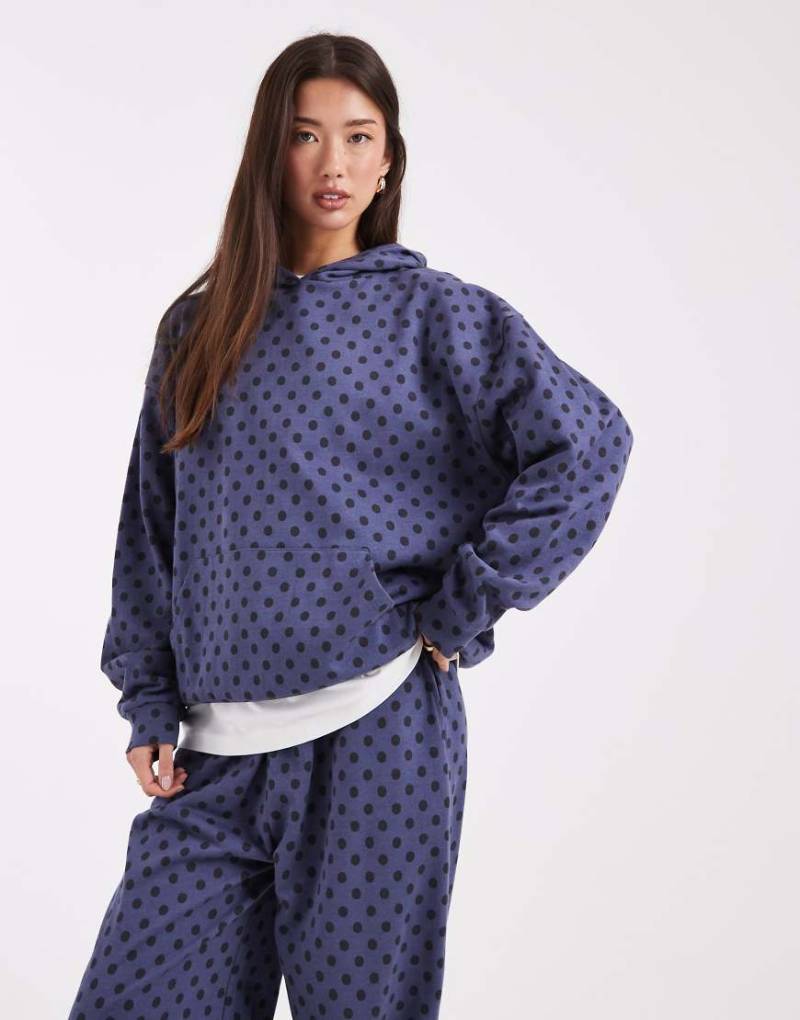 COLLUSION - Kapuzenpullover in Blau mit Punktemuster-Bunt von Collusion