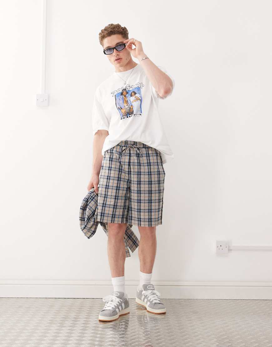 COLLUSION - Karierte Longline-Jorts in Blau von Collusion