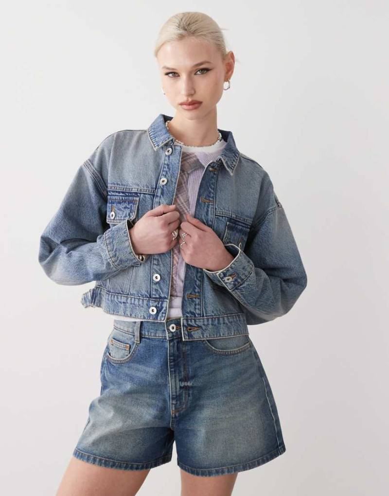 COLLUSION - Kastige Jeansjacke in Vintage-Waschung-Blau von Collusion