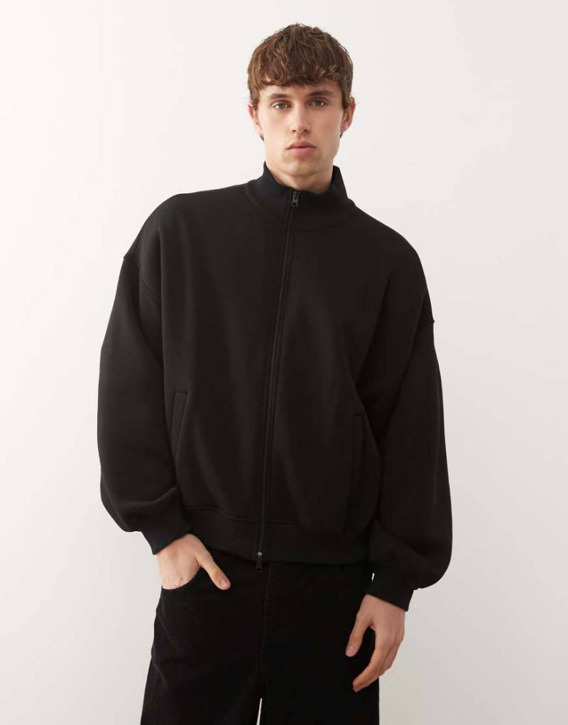 COLLUSION - Kastige Sweatjacke in Schwarz mit Stehkragen und durchgehendem Reißverschluss von Collusion