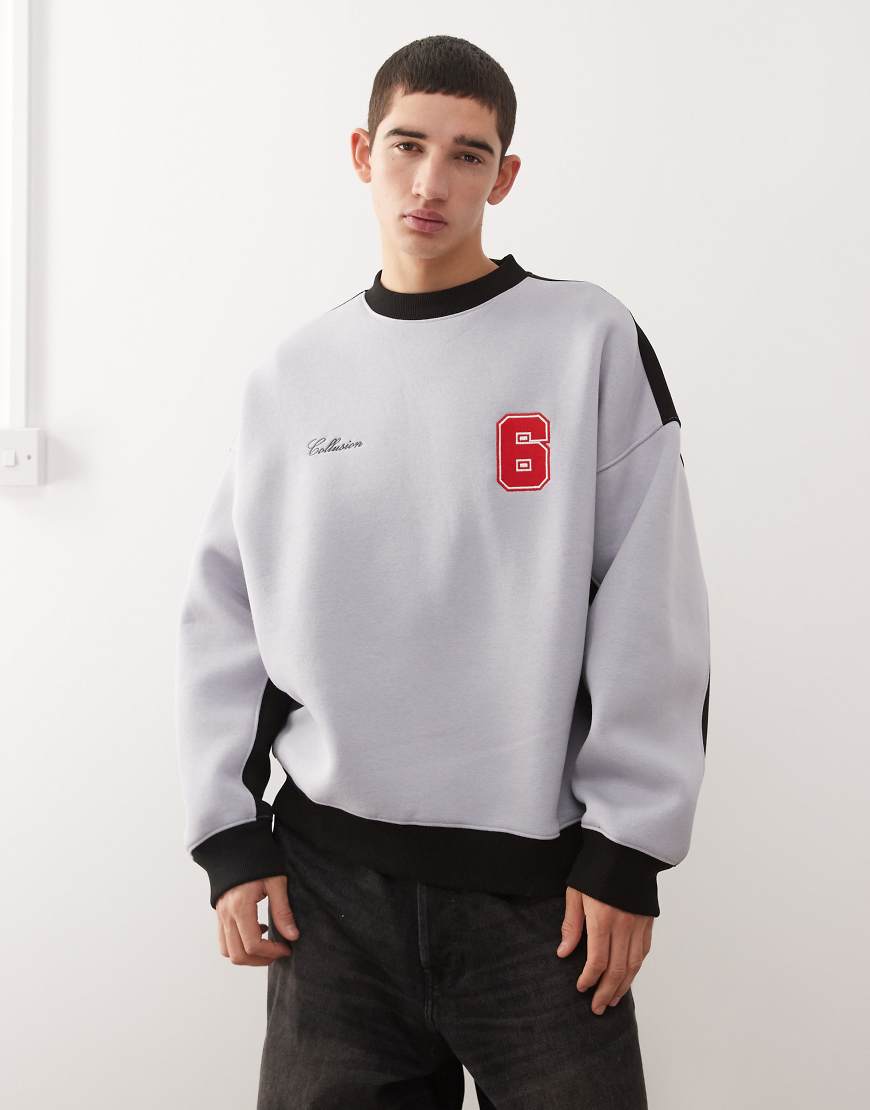 COLLUSION - Kastiges Sweatshirt im Football-Stil in Grau und Schwarz COLLUSION - Kastiges Sweatshirt im Football-Stil in Grau und Schwarz von Collusion