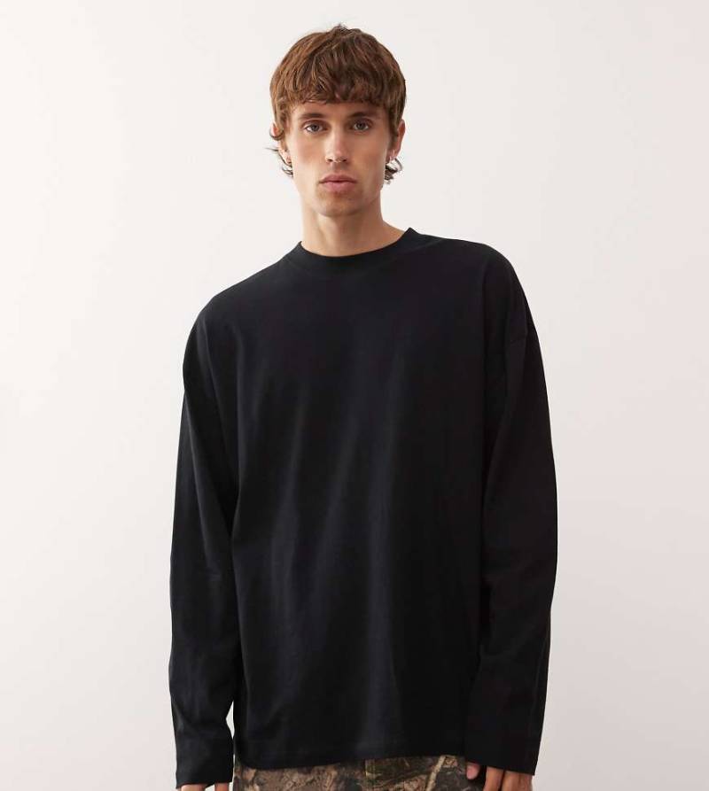 COLLUSION - Langärmliges Skater Fit Shirt in Schwarz mit Oversize-Schnitt von Collusion