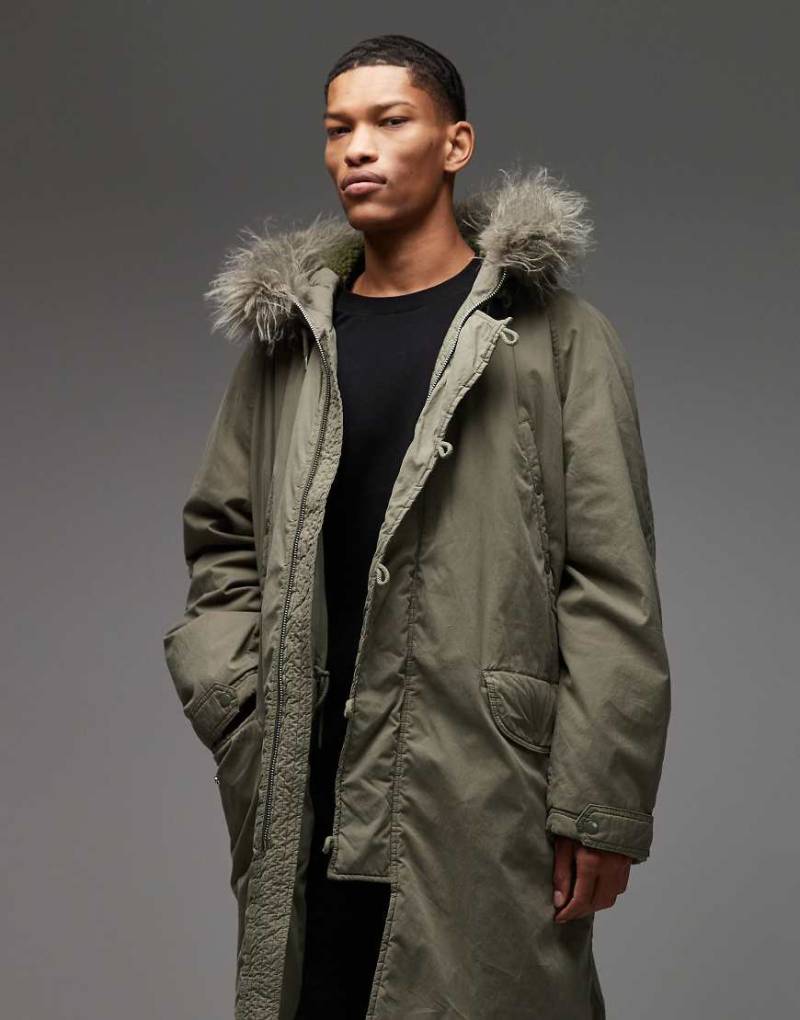 COLLUSION - Langer, gefütterter Parka in Khaki mit Kunstpelz-Grün COLLUSION - Langer, gefütterter Parka in Khaki mit Kunstpelz-Grün von Collusion