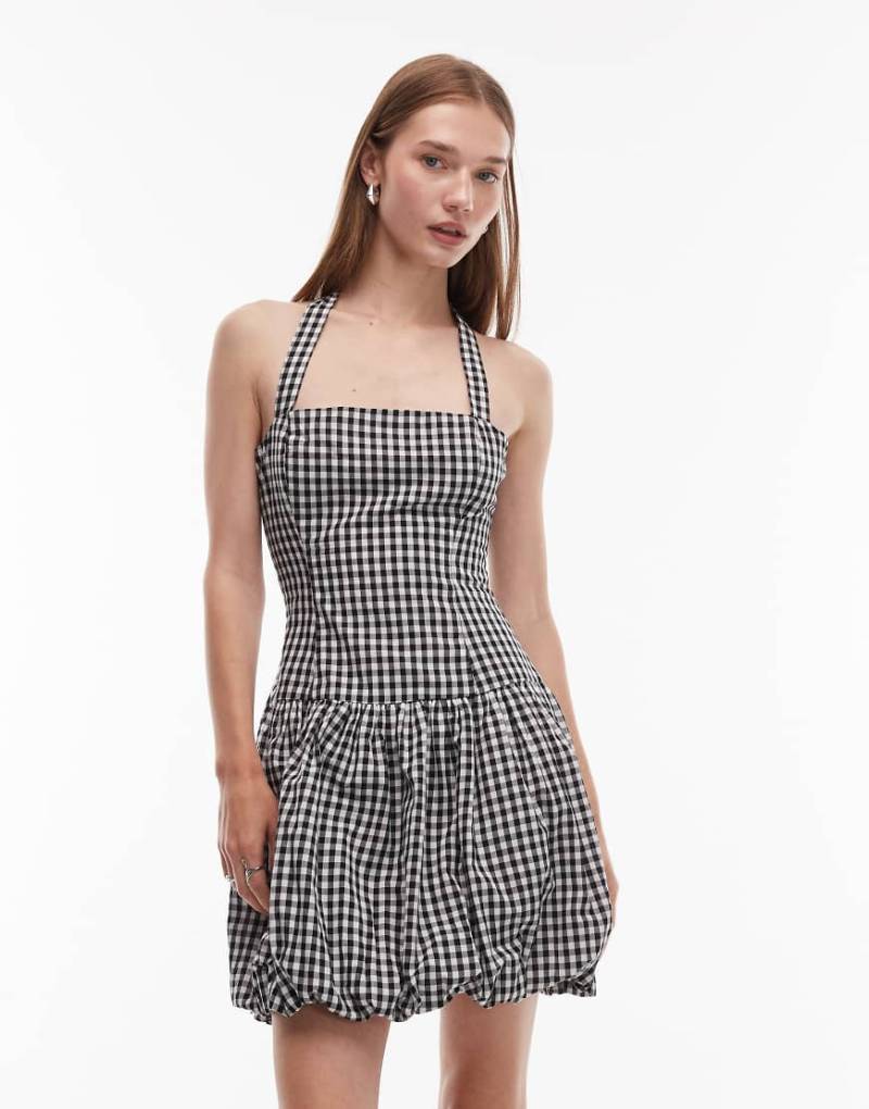 COLLUSION - Neckholder-Minikleid mit Vichykaros in Schwarz und Weiß sowie Ballonsaum von Collusion