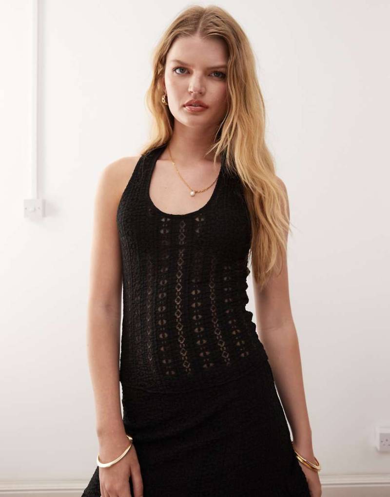 COLLUSION - Neckholder-Oberteil aus Spitze in Schwarz von Collusion