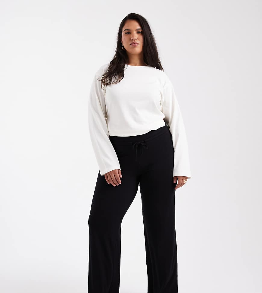 COLLUSION Plus - Yoga-Hose in Schwarz von Collusion